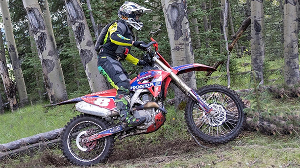 A Honda rider on an Enduro course