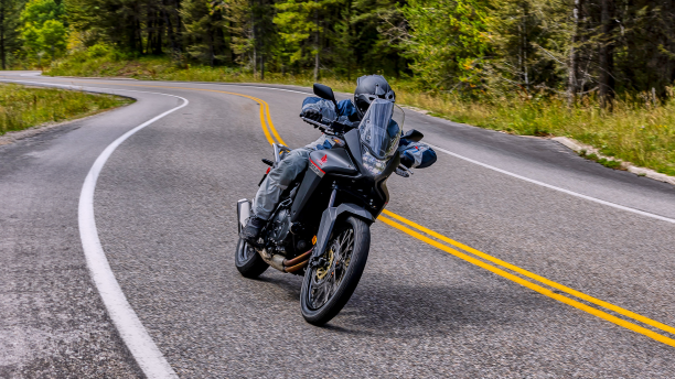 A rider on the highway on a Honda motorcycle 